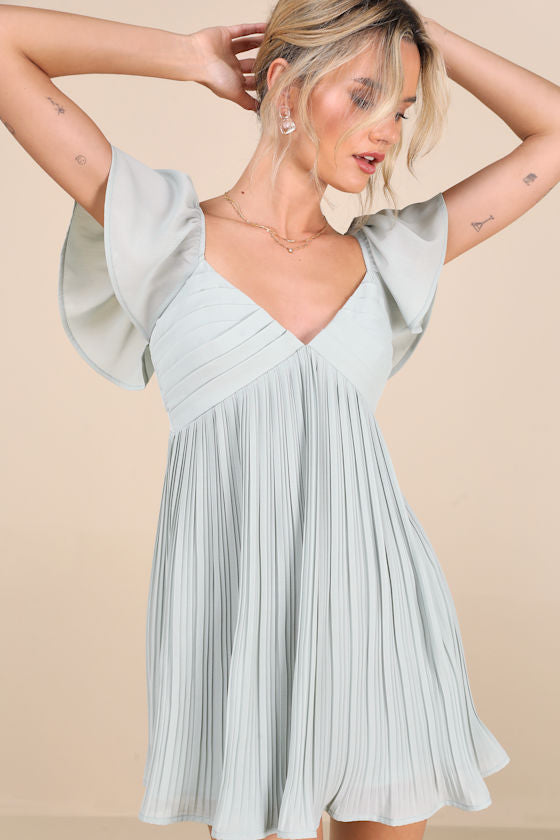 Amalfi Coast White Pleated Flutter Sleeve Mini Dress