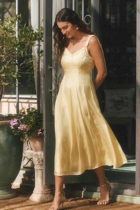 Marlana Light Yellow Sleeveless Ruffled Midi Dress
