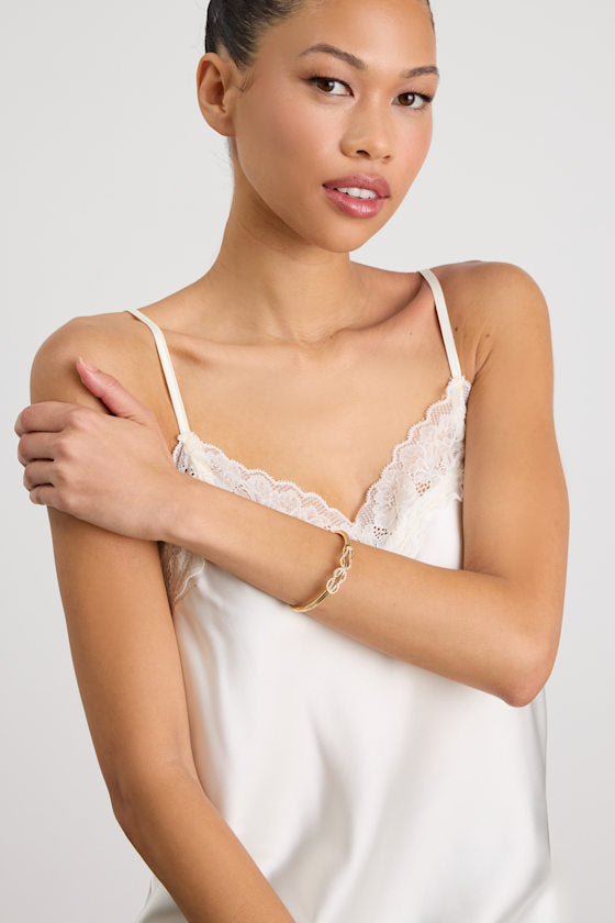 Trevena Gold Rhinestone Knotted Bangle Bracelet
